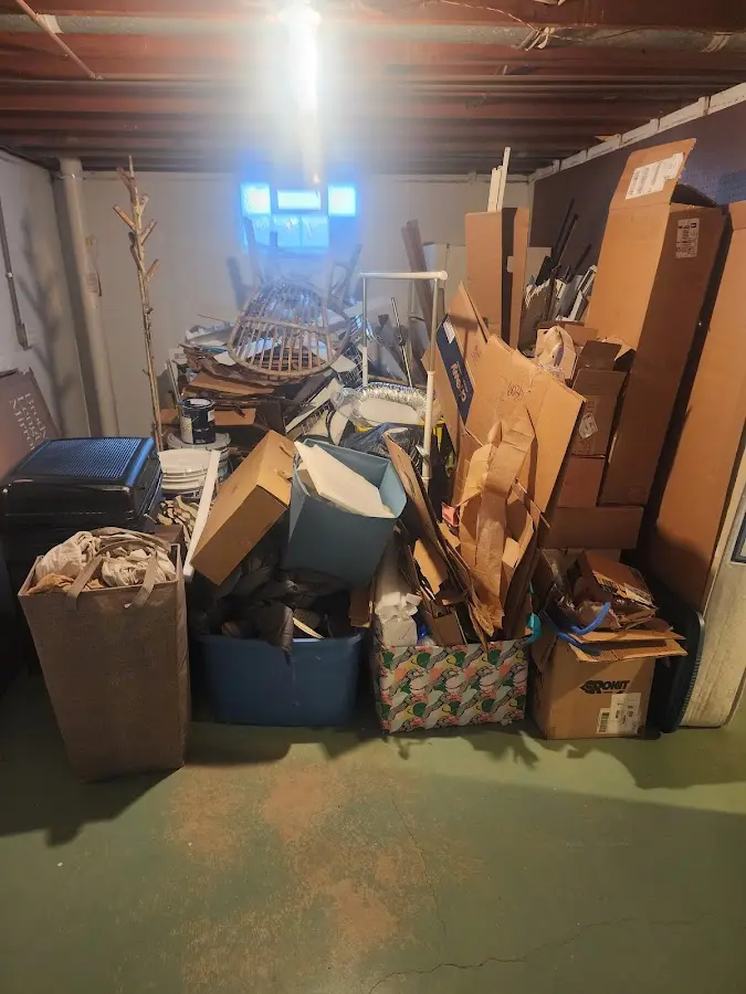 Roll-off dumpster container at job site for 15 Yard Dumpster Rental in Lake of the Woods